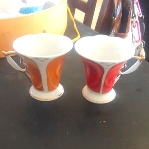 Set of Red and Orange Decorative Cups